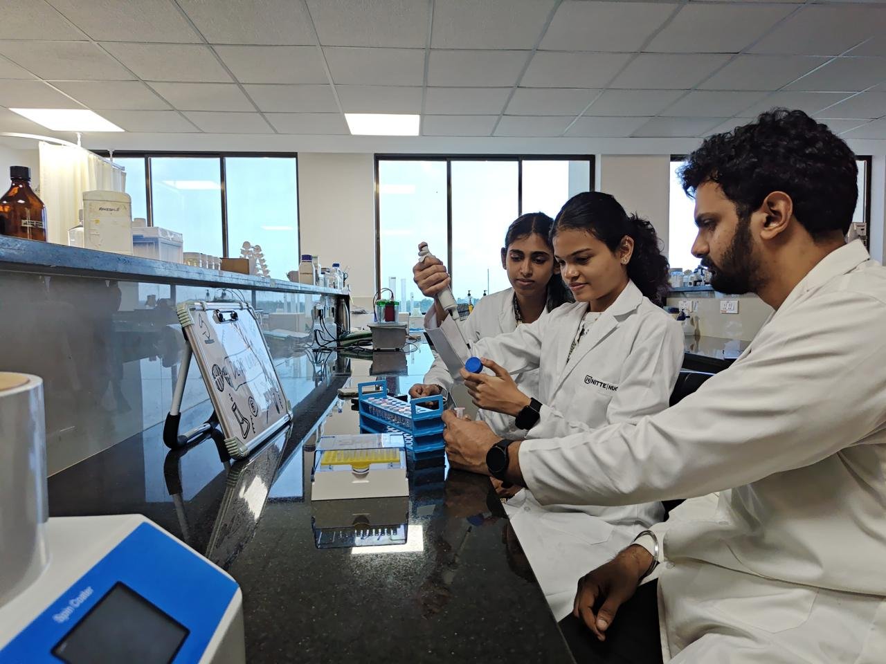 DEAR Lab members preparing samples at the bench