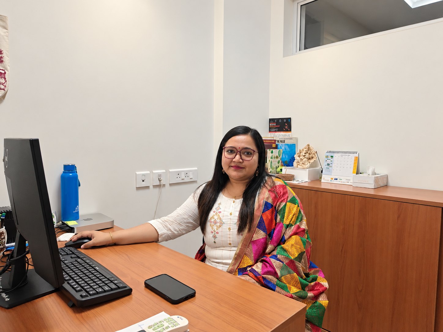 Dr. Arpita Ghosh at her desk at NUCSER
